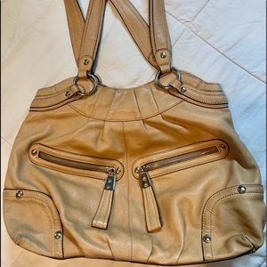 Camel color shoulder bag in new condition.